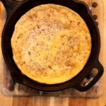 cast iron skillet with a pancake
