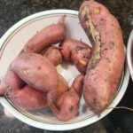 Sweet Potatoes covered in dirt