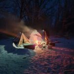 winter camping, bonfire and tents