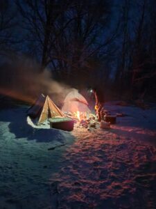 winter camping, bonfire and tents
